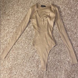 Sophisticated deep v body suite